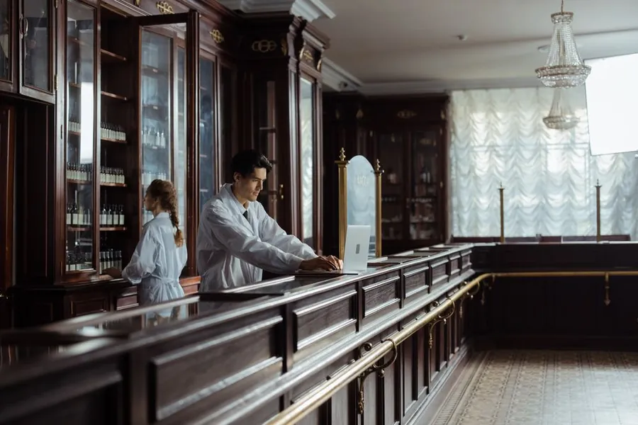 Pharmacist consulting at the clinic counter